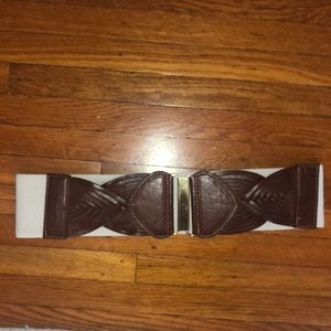 EUC belt with tan weaving pattern and gold buckle front closure